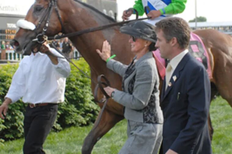 Gretchen Jackson pats Barbaro after he won the 2006 Kentucky Derby.