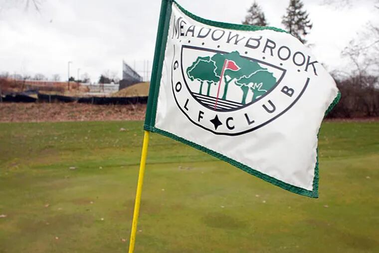 The Phoenixville Area School District recently voted to seize the Meadowbrook Golf course and acquire it through eminent domain. The property has been owned by the Brown family since 1896. Here, a flag flies over the 6th green on Wednesday, November 27, 2013. ( ED HILLE / Staff Photographer )