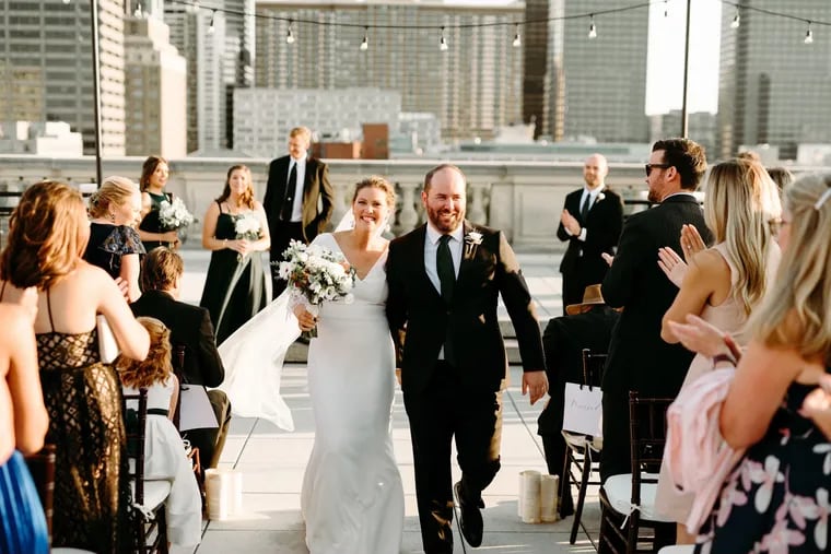 Lauren Gober and Scott Harkey at their Sept. 11, 2021 wedding atop the Philadelphia Free Library.