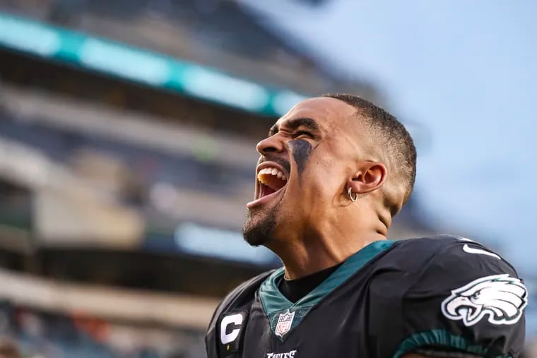 Philadelphia Eagles quarterback Jalen Hurts (1) celebrates with the home crowd after a 40-29 win over the New Orleans Saints at Lincoln Financial Field in South Philadelphia on Sunday, Nov. 21, 2021.