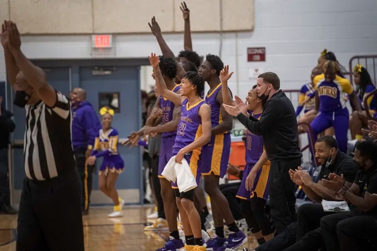 Camden High School, D.J. Wagner reacts on the bench as substitute players score 3 pointers against Eastern High School in Voorhees, N.J. Wednesday, January 11, 2022.