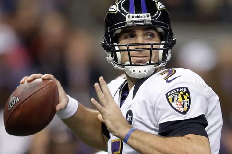 Ravens quarterback Joe Flacco (5) looks to throw a pass during the first half of the NFL Super Bowl XLVII football game against the San Francisco 49ers Sunday, Feb. 3, 2013, in New Orleans. (Evan Vucci/AP file)