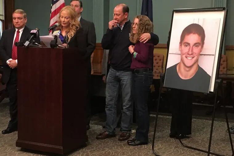 At podium is Stacy Parks, Miller Centre County District Attorney, with parents of Timothy Piazza, 19, of Readington Township, N.J. during a press conference at Bellefonte courthouse on Friday morning May 5, 2017. Timonthy's parents are James and Evelyn Piazza. (David Swanson/Philadelphia Inquirer/TNS)