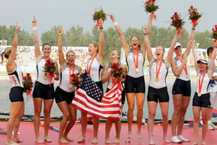 The gold-medal-winning women's eight in Beijing, Susan Francia just to the right of the American flag.