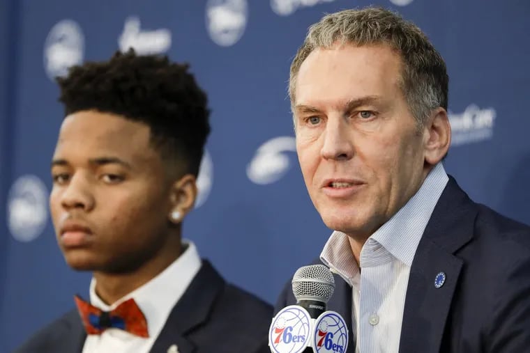 Bryan Colangelo, Sixers team president, sits with first overall pick Markelle Fultz after the 2017 NBA draft.