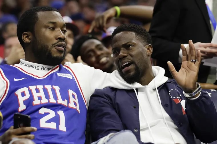 Rapper Meek Mill with comedian Kevin Hart during the Sixers and Miami Heat game five of the Eastern Conference quarterfinals.
