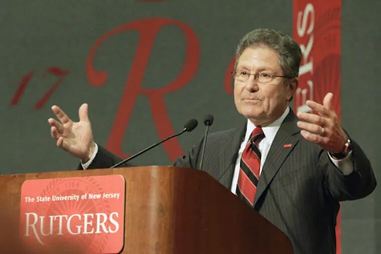 FILE - Rutgers President Richard L. McCormick gestures as he delivers his sixth annual address to the university community in September 2008, in New Brunswick, N.J. (AP Photo/Mel Evans)