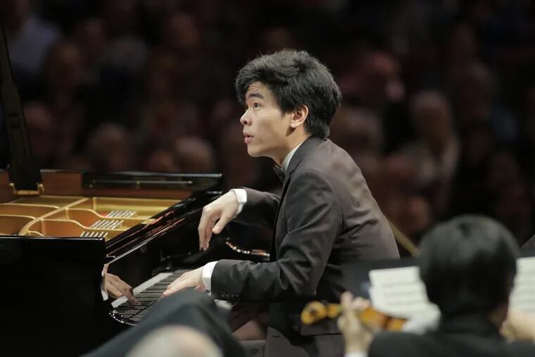 June 10, 2017. Daniel Hsu of the United States performs with conductor Leonard Slatkin and the Fort Worth Symphony Orchestra on Saturday in the Final Round of the Fifteenth Van Cliburn International Piano Competition held at Bass Performance Hall in Fort Worth, Texas.