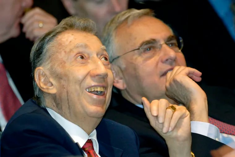 In this 2006 photo, Philadelphia attorney Richard A. Sprague (left) and Chicago developer Neil Bluhm react as the Pennsylvania Gaming Control Board awarded their SugarHouse casino a license to run a slot-machine gambling parlor in Philadelphia.