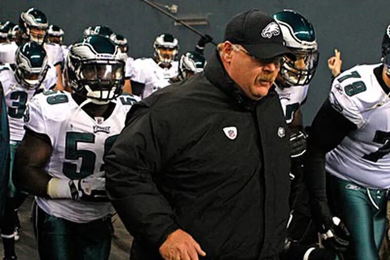 Andy Reid led the Eagles out on the field prior to their 31-14 loss to the Seahawks. (Ron Cortes/Staff Photographer)