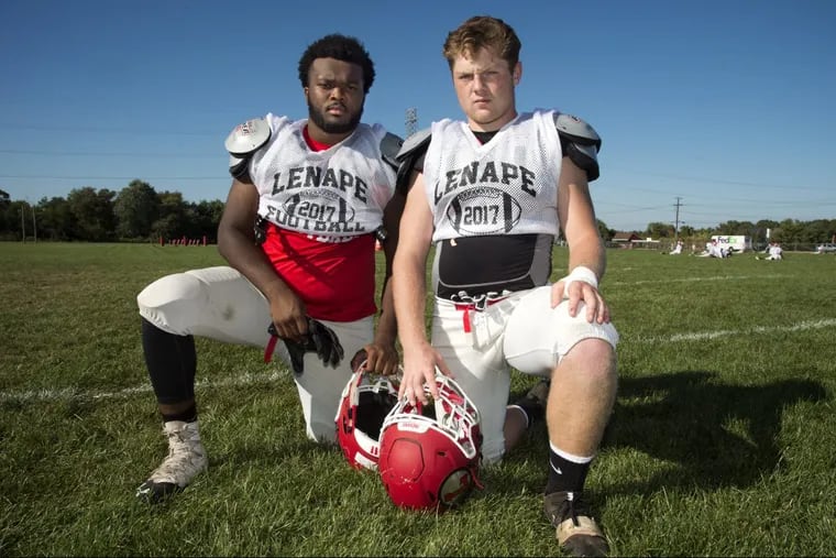 Seniors Aaron Acosta (left) and Mike Galaida lead the Lenape football team’s strong defense.