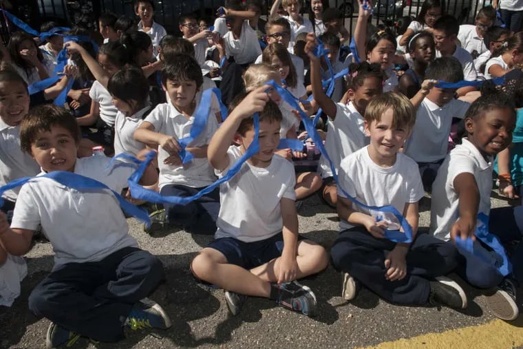 McCall Elementary students celebrate Thursday’s news that the K-8 campus in Center City was among nine local schools receiving the National Blue Ribbon award.