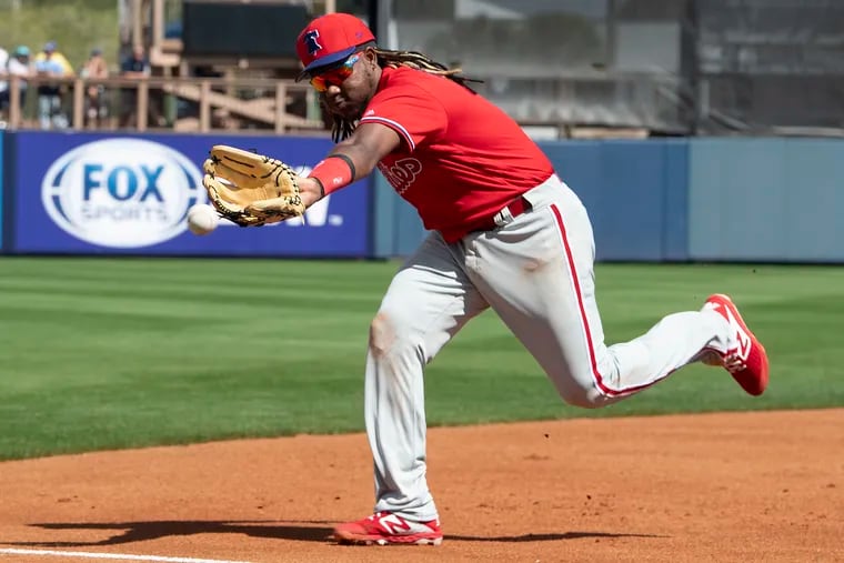 Maikel Franco fields a ball on third base during the second inning of the Philadelphia Phillies' spring training win over the Tampa Bay Rays. Franco hit a home run in the fifth inning.