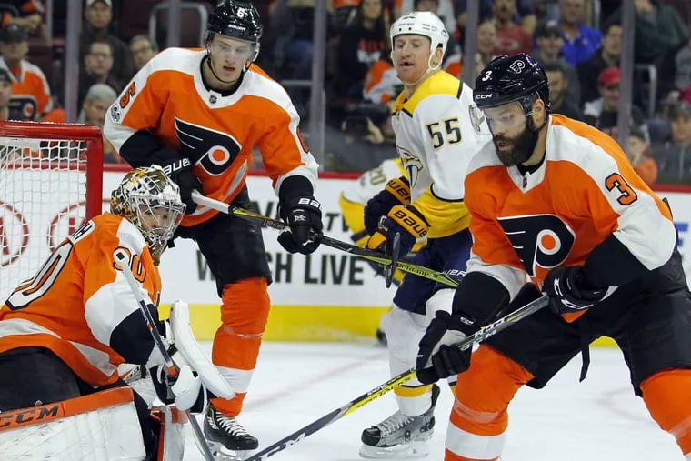 The Flyers were allowing nearly five goals per game in the five contests Radko Gudas (right) had missed entering Tuesday.