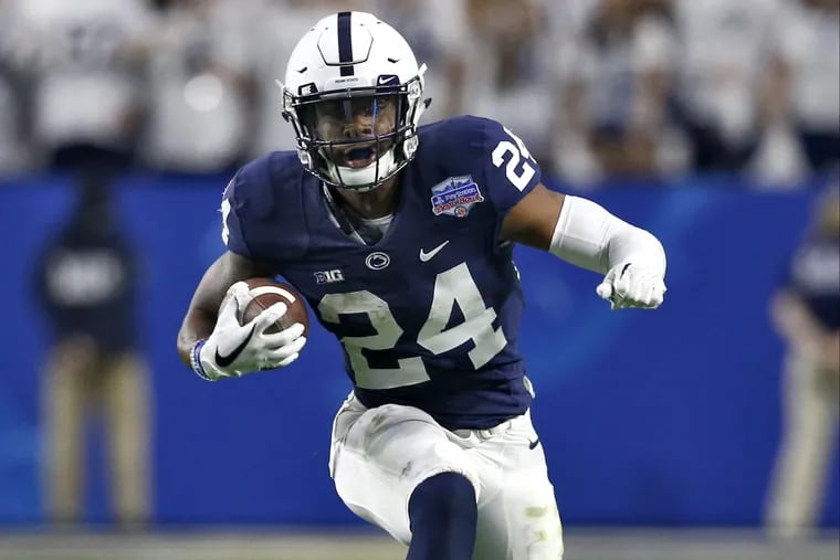 Penn State running back Miles Sanders (24) runs against Washington during the second half of the Fiesta Bowl NCAA college football game, Saturday, Dec. 30, 2017.