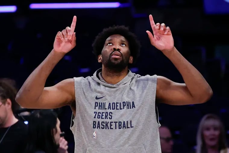 Sixers center Joel Embiid took part in warmups and will play in Game 5 against the Knicks.