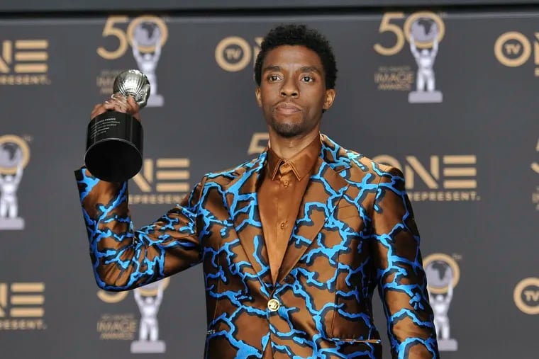 Chadwick Boseman poses in the press room with the award for outstanding actor in a motion picture for "Black Panther" at the 50th annual NAACP Image Awards at the Dolby Theatre in Los Angeles on March 30, 2019.