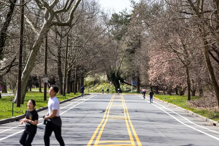 People were out riding their bikes and running along Martin Luther King Jr. Drive in Philadelphia on Saturday, the first day it closed to cars on weekends for the season.