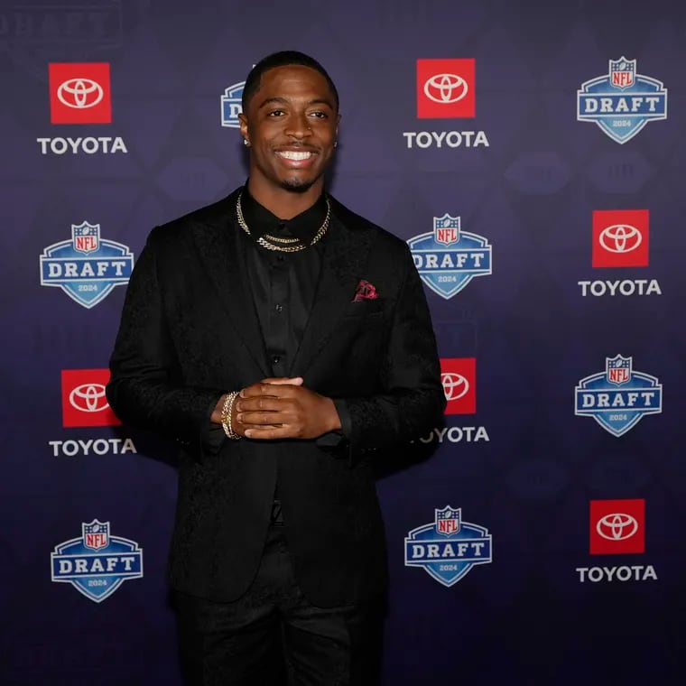 Toledo cornerback Quinyon Mitchell poses on the red carpet in Detroit before the Eagles made him their first-round pick.
