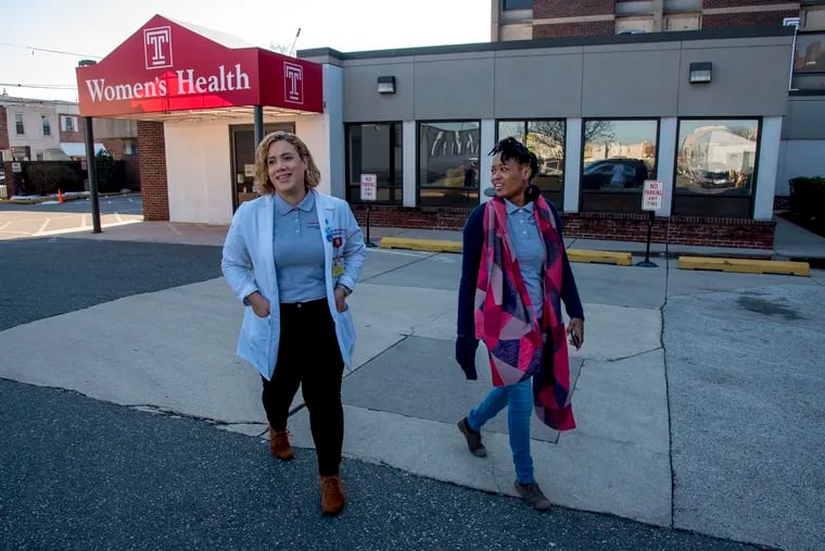 Breastfeeding Latinas founder Ileana Berrios (left) with project educator MaryNissi Lemon (right) outside their offices at Temple Women's Care at Northeastern February 21, 2019.