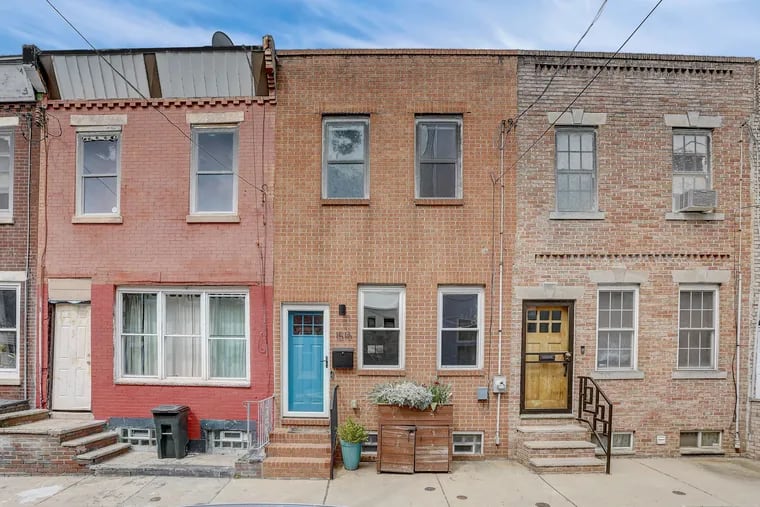 In Point Breeze, this rowhouse has two bedrooms, two bathrooms, a deck, and a finished basement.