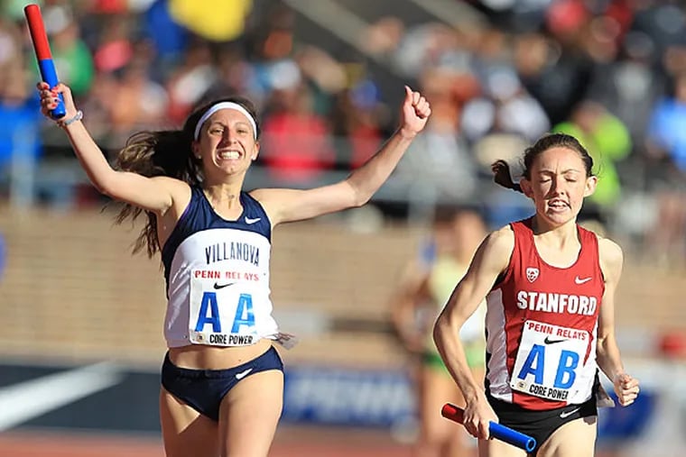 Villanova's Emily Lipari (left) edges out Aisling Cuffe of Stanford at the finish in the College Women's Distance Medley Championship of America at the Penn Relays on April 24, 2014. (Charles Fox/Staff Photographer)