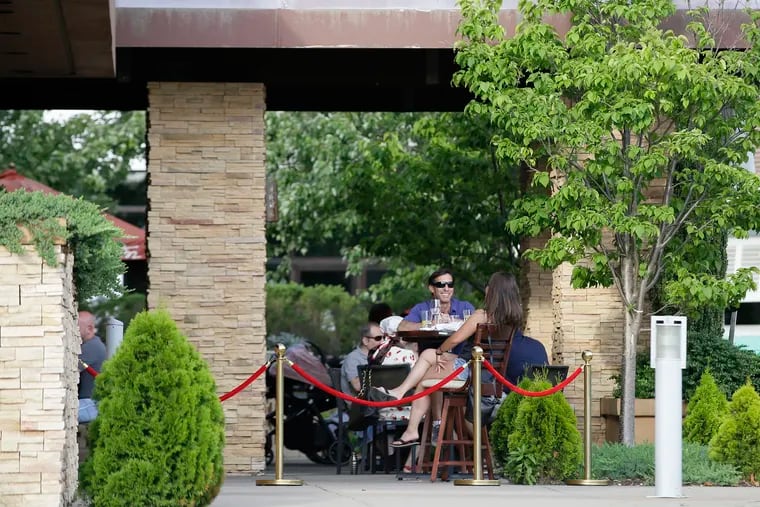 Folks enjoying outdoor dining at Seasons 52 at the Cherry Hill Mall in Cherry Hill, N.J. on June 28, 2020.