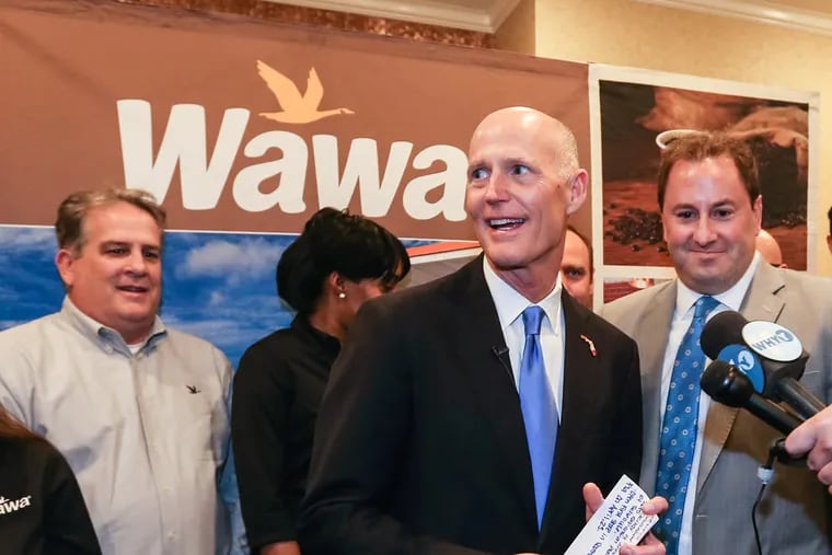 Florida's Republican governor, Rick Scott, seen here in one of the 61 Wawa stores that have opened in Florida.