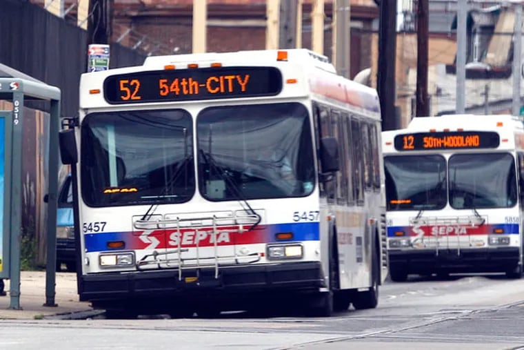 SEPTA buses along Woodland Avenue in West Philadelphia. (Yong Kim / Staff Photographer)