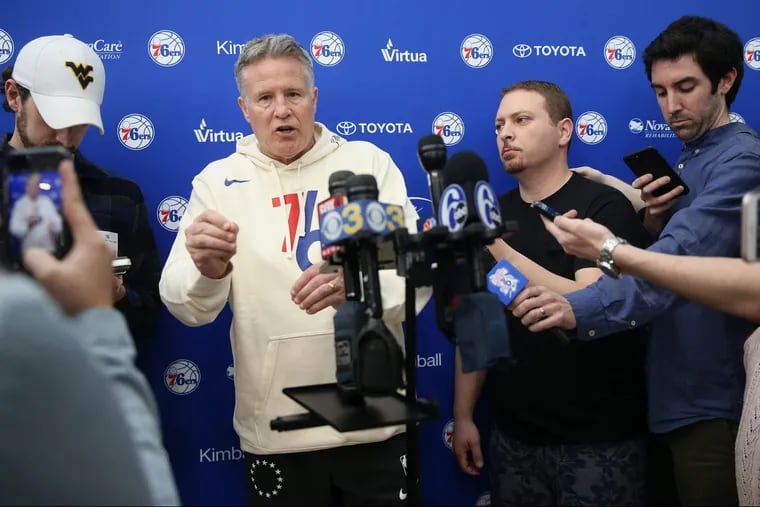 Sixers coach Brett Brown talking to reporters Thursday.