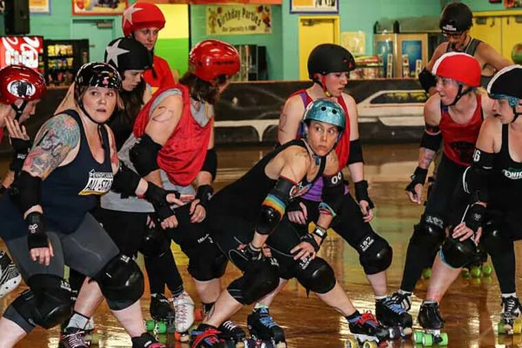 The Philly Roller Girls are tough, powerful, aggressive and, when necessary, violent. (Steven M. Falk/Staff Photographer)
