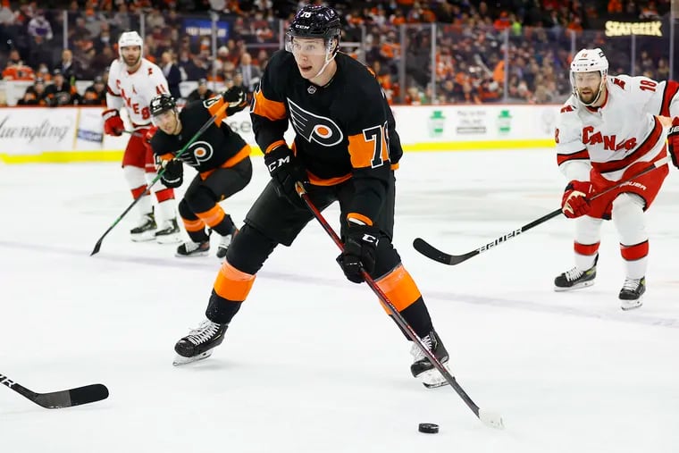 Flyers left wing Isaac Ratcliffe skates with the puck against the Carolina Hurricanes on Monday, February 21, 2022 in Philadelphia.