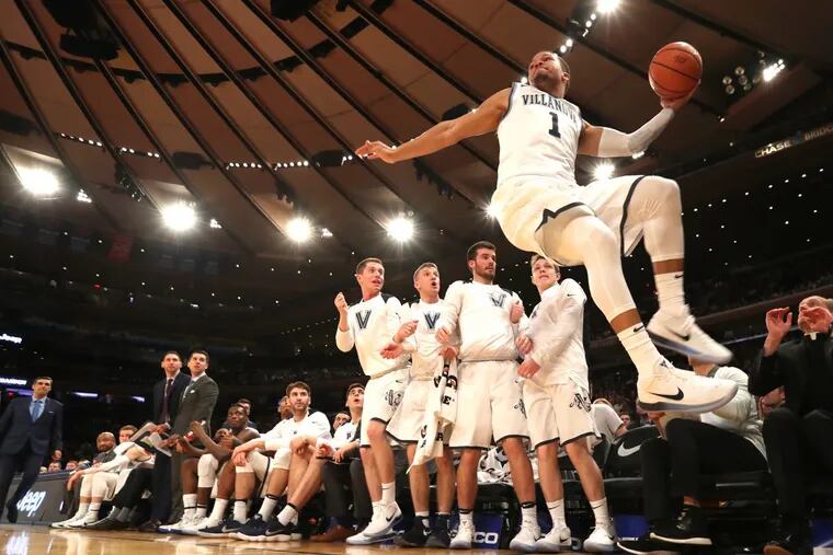 Jalen Brunson of Villanova leaps to save a ball from going out of bounds against Butler during the 2nd half in the Big East Tournament semi-finals at Madison Square Garden on March 9, 2018.