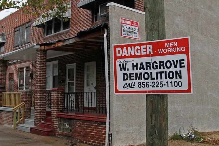 Property at corner of Norris and Decatur in Camden. A long-awaited demolition projected slated to take down 660 abandoned properties is finally underway. ( RON CORTES / Staff Photographer )