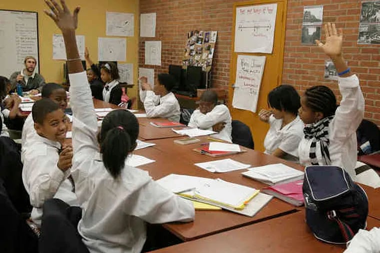 Students participate in a seventh-grade class at Eastern University Academy Charter School in November 2009.