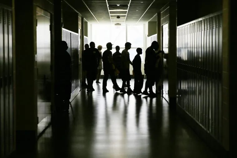 Students walk the halls during an open house at Kensington High School for the Creative and Performing Arts in 2013.