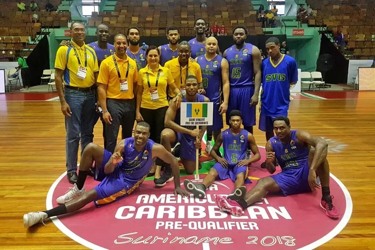 Arcadia coach Justin Scott (second from left in yellow shirt), who grew up in Germantown, is the coach of the men's national team of St. Vincent and the Grenadines.