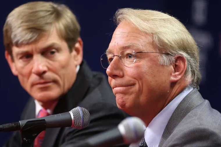 Phillies president Andy MacPhail, right, was hired in 2015 by majority partner John Middleton, left.