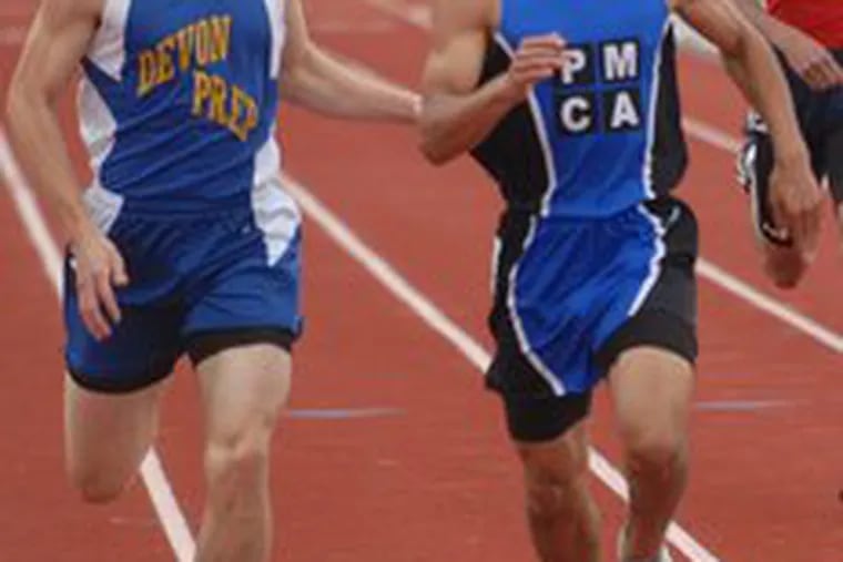 Phil-Mont Christian&#0039;s Sam Negley (right) hangs on to beatDevon Prep&#0039;s Steve Rachman in the Class AA 400 meters.