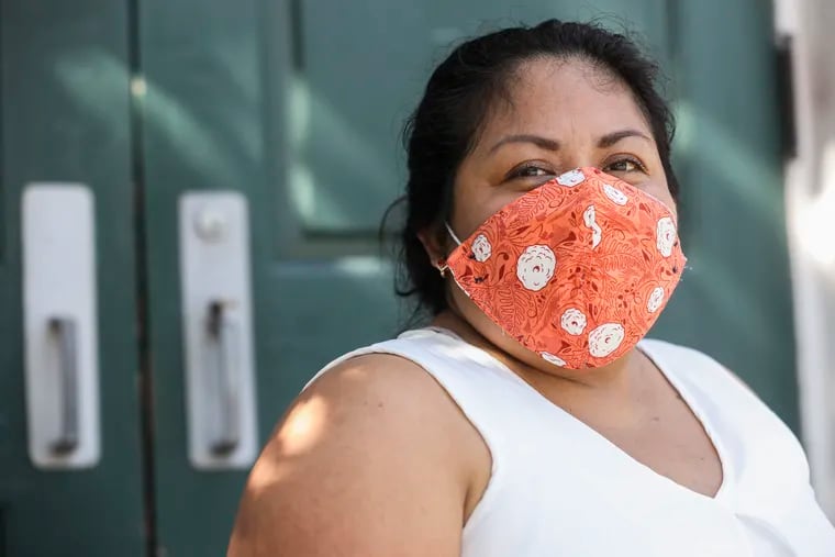 Carmela Apolonio Hernandez is pictured here outside the Germantown Mennonite Church in Philadelphia, where she and her children have lived in sanctuary for three years to forestall deportation to Mexico.