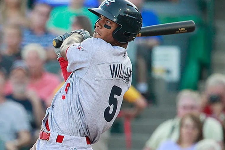 Nick Williams of the Reading Fightin Phils hits a long fly ball in his 2nd at bat for the for Reading on August. 4, 2015, at Trenton. Williams was part of the Cole Hamels trade.