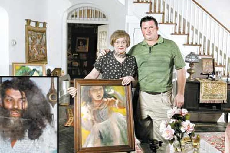 Marguerite Sinkovics shows art by son Jules Csatary (inset). Rich McIlhenny, realty agent and friend, is by her side. (MICHAEL S. WIRTZ / Staff Photographer)