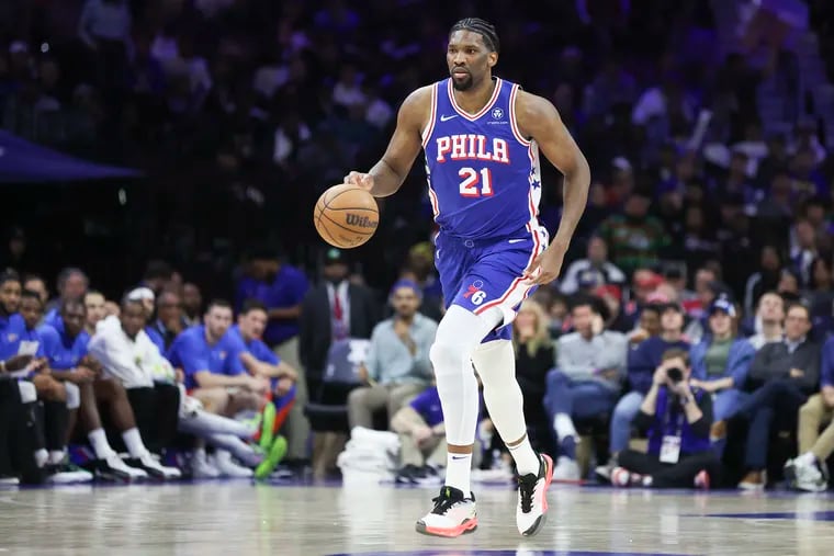 Sixers center Joel Embiid brings up the ball during a game against Oklahoma City in his first game back from injury on Tuesday.