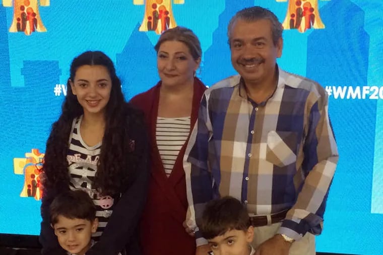 The Sargi family came all the way from Syria to meet Pope Francis and receive a signed copy of the Gospel of Luke on Sunday.