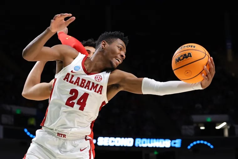 Alabama star freshman Brandon Miller grabs a rebound during his team’s blowout win over Maryland in the NCAA Tournament’s Round of 32. The top-seeded Crimson Tide are sizable favorites in Friday’s Sweet 16 matchup against No. 5 seed San Diego State. (Photo by Kevin C. Cox/Getty Images)