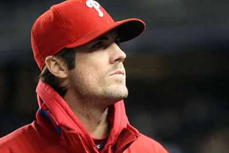 Cole Hamels is 1-2 this postseason with a 7.32 ERA. (Yong Kim / Staff Photographer)