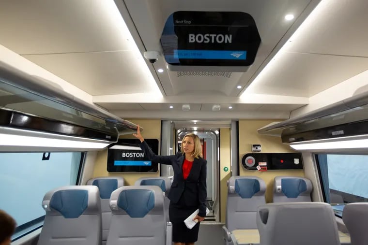Caroline Decker, vice president of Amtrak Northeast Corridor service, gives a tour of the interior of new Amtrak Acela Express cars at the Alstom facility in New Castle, Del.