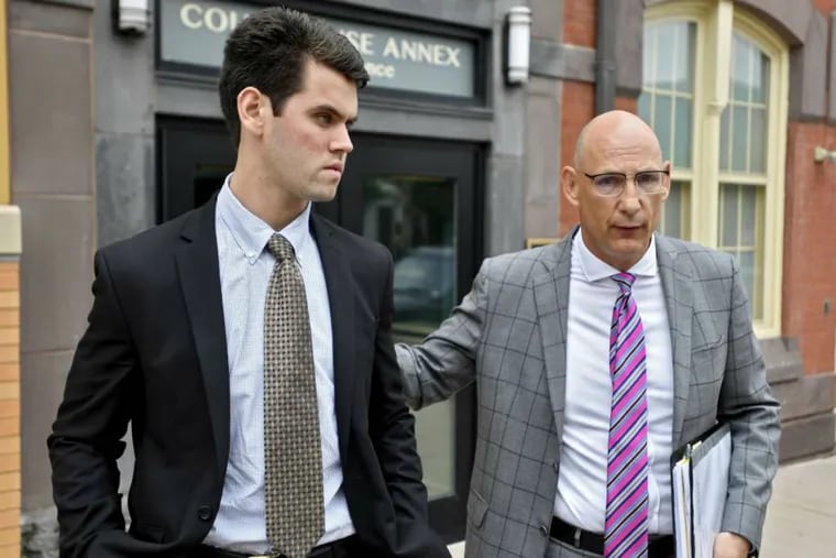FILE – In this June 13, 2018, file photo, Ryan Burke, left, who was a fraternity brother at Penn State University's shuttered Beta Theta Pi chapter, walks with his attorney Philip Masorti on the day Burke pleaded guilty to four counts of hazing and five alcohol-related offenses related to the death of 19-year-old fraternity pledge Timothy Piazza, of Lebanon, N.J., outside the Centre County Courthouse Annex in Bellefonte, Pa. Burke is set to learn his sentence, on Tuesday, July 31.