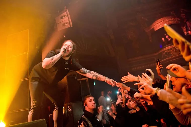 Post Malone performs Dec. 12, 2016, at Electric Brixton in London. The rapper played the Festival Pier on Wednesday.