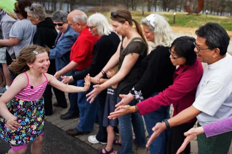 Molly Verging set the world record in under a minute as she high-fived more than 260 hands.